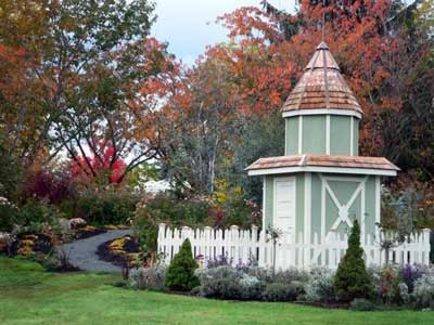 Well house with fall color behind